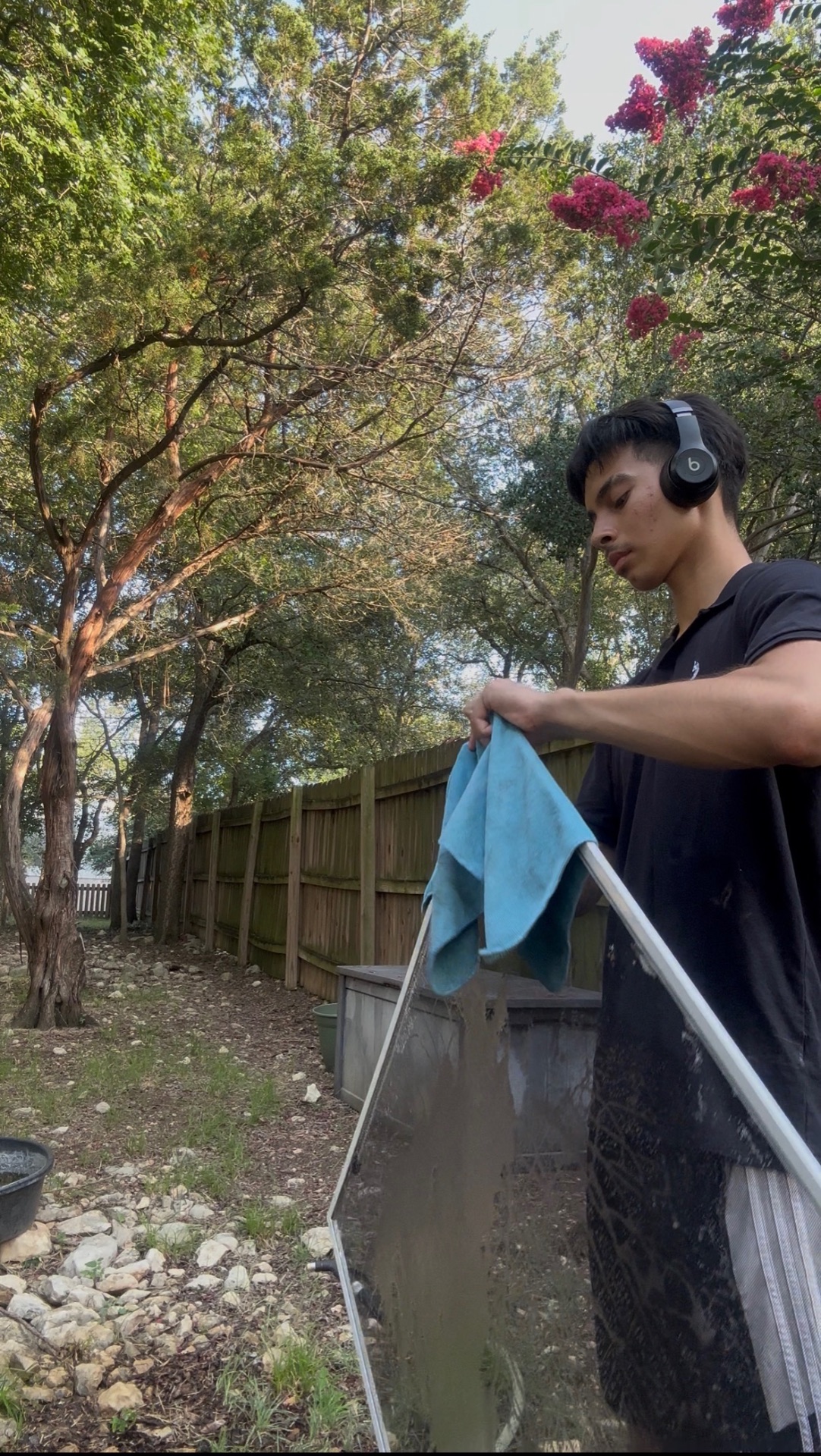 Douglas Exterior Services technician providing professional window cleaning in San Marcos, Texas
